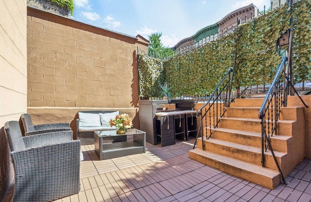 Family-Friendly Duplex Near Subway | Patio + Games