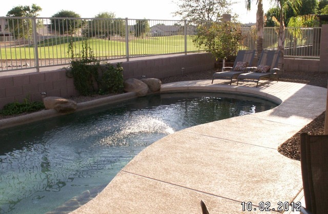 Family Friendly Home with HEATED Pool Located on a Golf Course