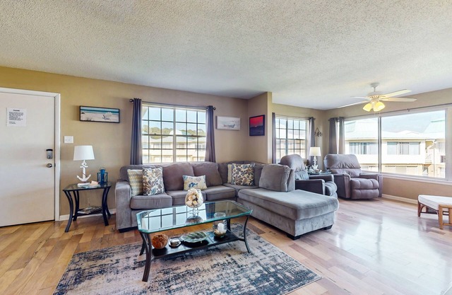 Family-friendly, beachfront getaway w/a stainless kitchen & shared pool