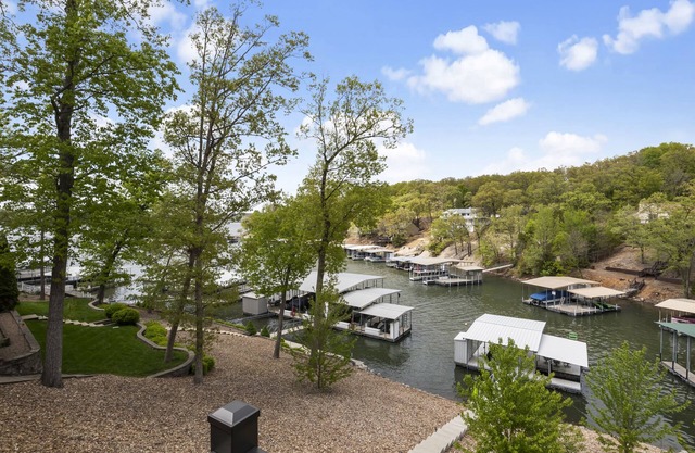 Family Fun Awaits at this Renovated Lakefront Osage Beach Home with Private Dock