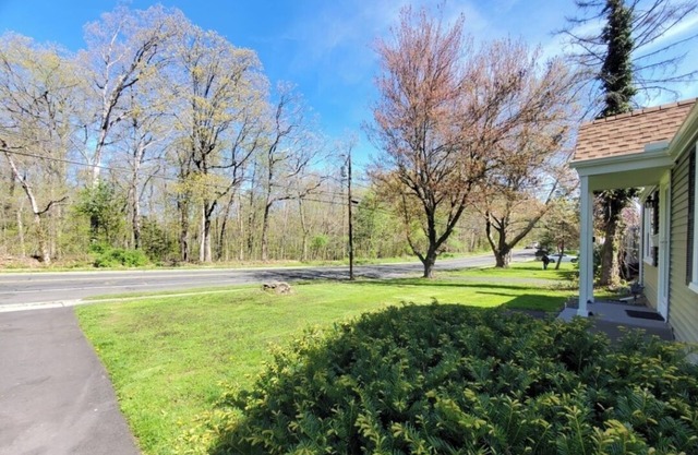 Fave Cape Cod Style Home Retreat: with Main-Level Bedroom bordering Farmington