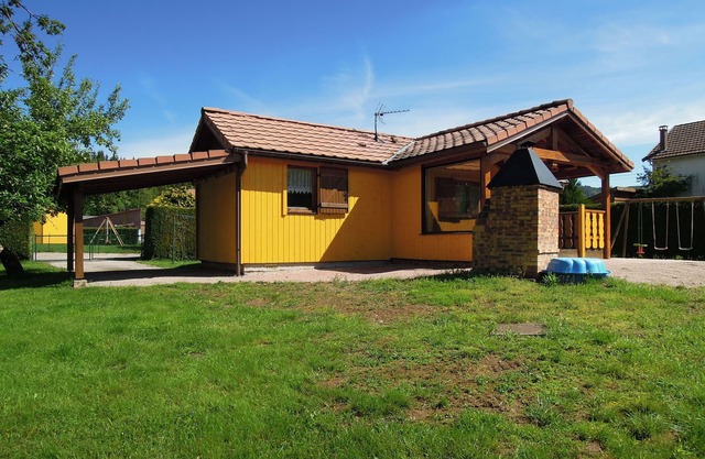 Fenced cottage rental with barbecue and children's play area