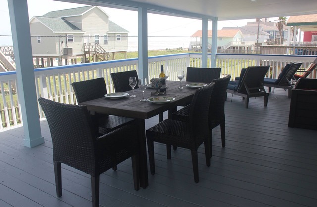 Few Steps from beach, fabulous view from ginormous gated deck!