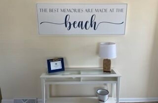 First floor three bedroom, two full bath unit two blocks from the beach