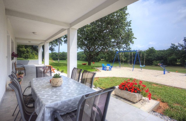 Flat with large garden, play area