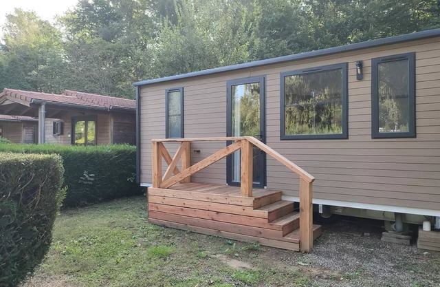 Flower Camping du Lac de la Seigneurie * - Cottage Ohara Premium Garden Side 30m2-2 bedrooms 1 bed160-Semi-covered terrace- Forest view- LV 4 people