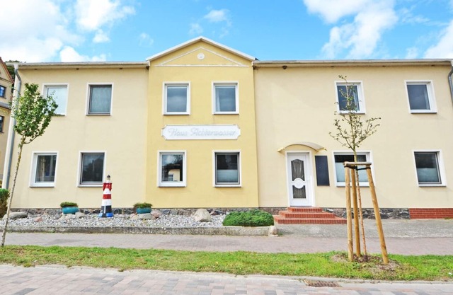 For max. 21 people, 10 rooms with bathroom, common room with kitchen, terrace