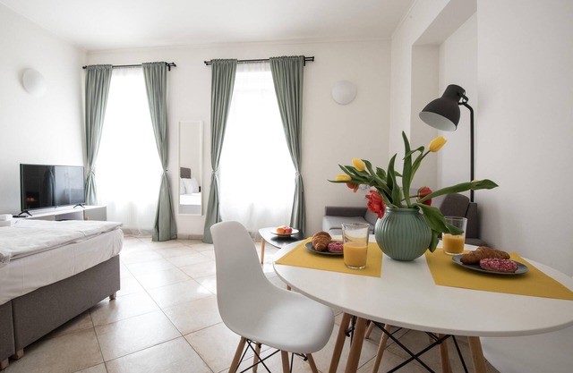 Four bed studio apartment in the first floor with bathroom and kitchen