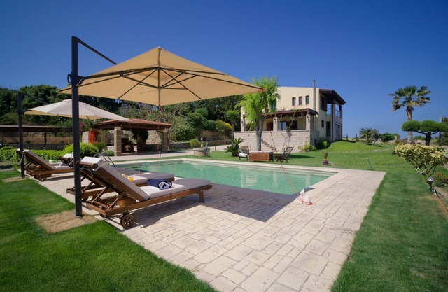 Four-Bedroom Villa with a Pool, 400m from the Beach!