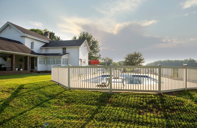 Franks Place-a beautiful 3 BR farm house retreat space with an in ground pool.