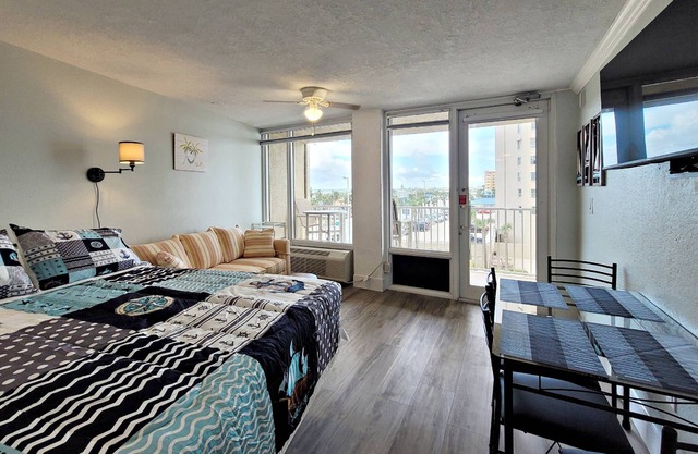 FREE DAILY ACTIVITIES! Corner Unit w/Private Balcony to Catch the Action Overlooking City & Ocean!