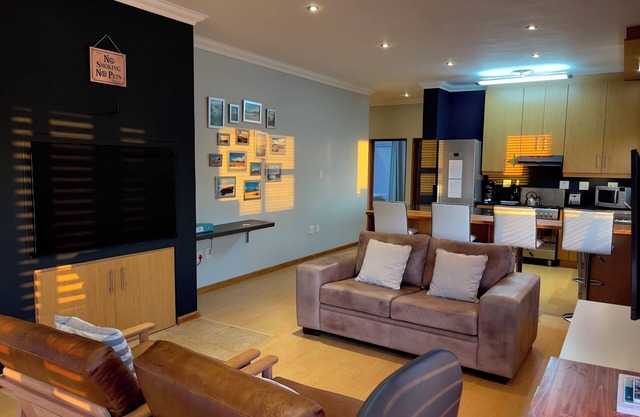Fully equipped self-catering apartment steps away from ocean.