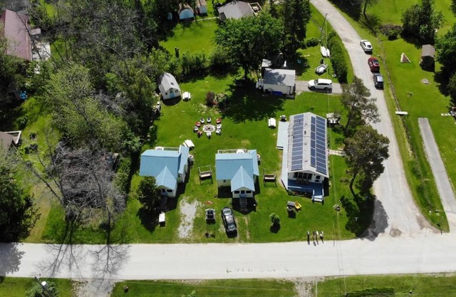 Fun Place with a Sandy Beach for Swimming, Boating & Fishing, Featuring 1 House and 3 Cabins