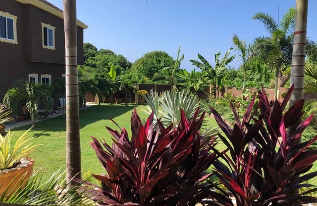 Garden View Two Bedroom Apartment with En-Suite, Open Kitchen and Living Room