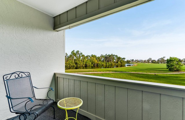 Golf course-adjacent home with shuffleboard table & furnished patio