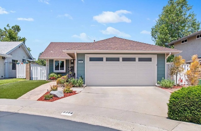 Golf course views abound in this picturesque Shadowridge Cottages home,