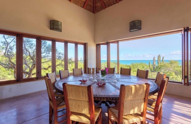 Gorgeous beach front home with pool and pickleball court.