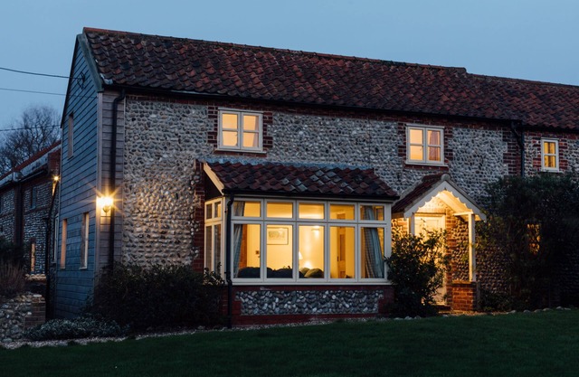Gorgeous flint cottage overlooking the marshes, walking distance to beach