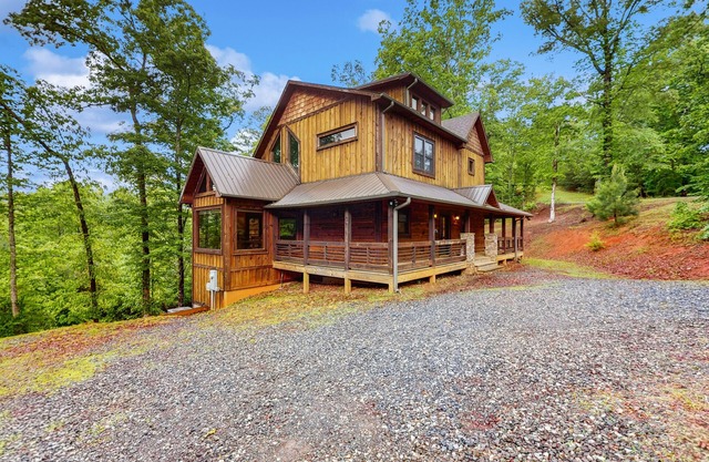 Gorgeous home with wraparound deck, private hot tub, and full bar