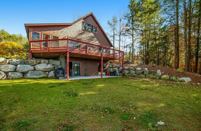Gorgeous Lakefront Home with a Fire Pit, Two Living Areas, and a Sunroom