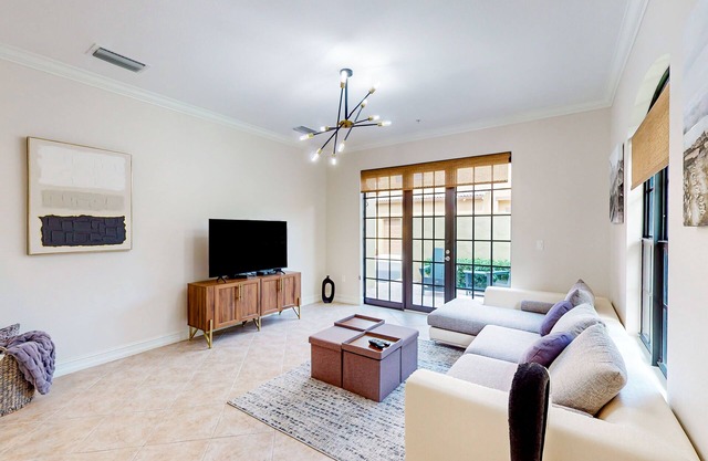 Gorgeous & modern sunlit oasis with pool, patio, tennis courts, gym, & W/D