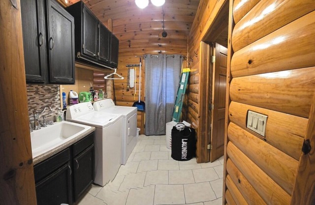 Gorgeous, Secluded Large Log 4 Bedroom Cabin with a pond view on several acres!