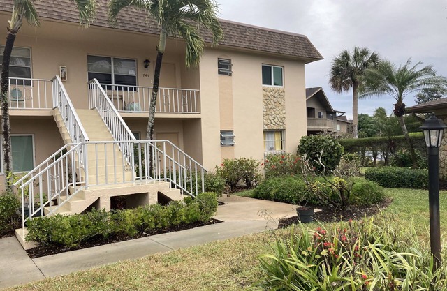 Great condo on main level with beautiful backyard.