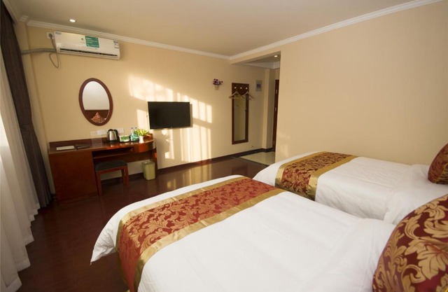 GreenTree Inn Jiangsu Yancheng Dongtai Jianggang Yingbin Road Gangcheng Avenue Business Hotel