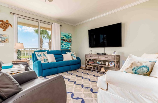 Ground-floor condo with beachfront access, pool, patio, & 2 full kitchens