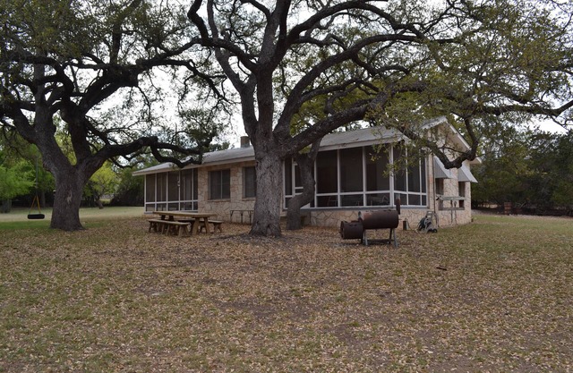 Guadalupe riverfront wooded Hill Country acreage located in Downtown Hunt, TX