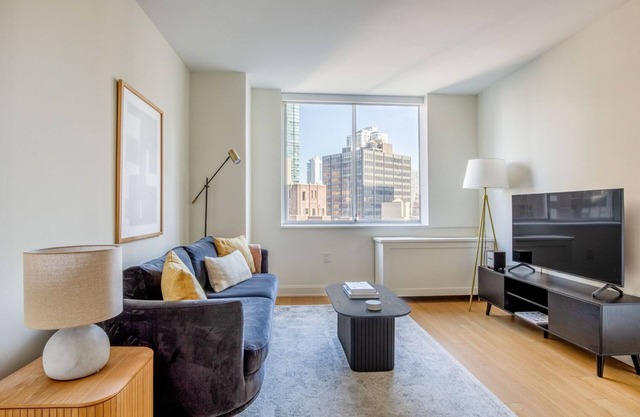 Hip Midtown East 2BR w/Gym, Doorman & W/D, nr Parks, by Blueground