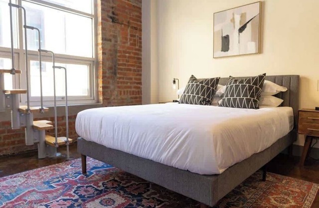 Historic brick charm 1BR downtown