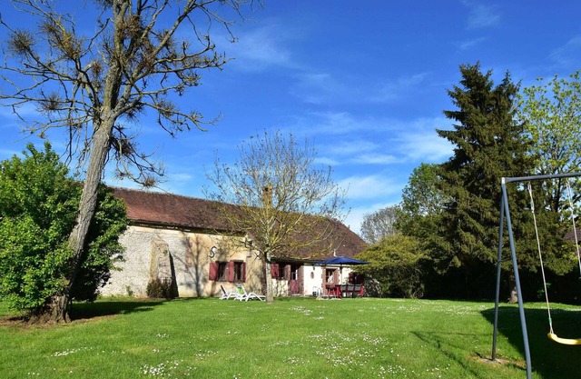 Holiday home with private garden on a farm