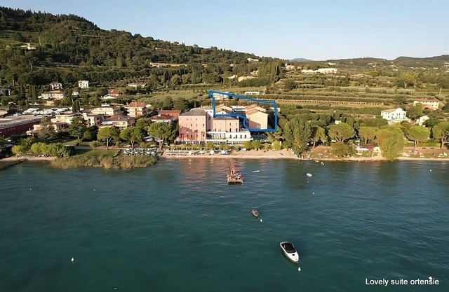 Holiday apartment with private beach,lake view, elegant, new on the lakefront