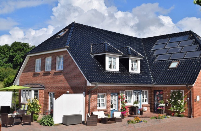 Holiday apartments with garden and terrace in an idyllic harbor town