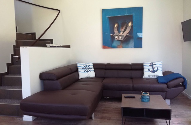 Holiday apartment or Holiday house with private beach on the lake in Aurich-Tannenhausen
