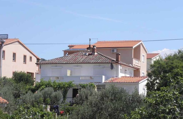 Holiday apartment with air conditioning and sea view