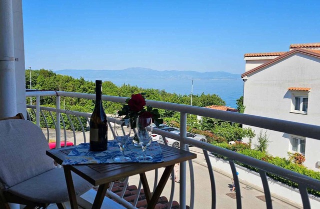 Holiday apartment with balcony and sea view
