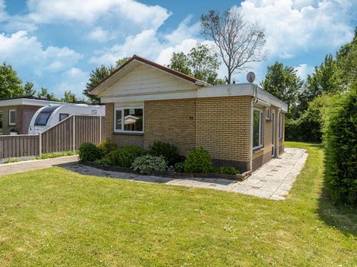 Holiday home in Baarland with garden