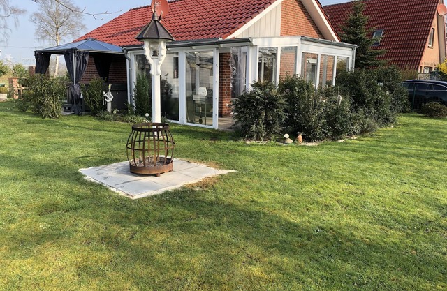 Holiday house stork nest on the amber lake with outdoor whirlpool and sauna