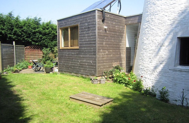 home in the Flemish Ardennes between the meadows