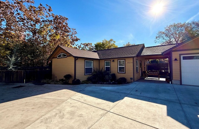 Home with gated driveway near River & Downtown