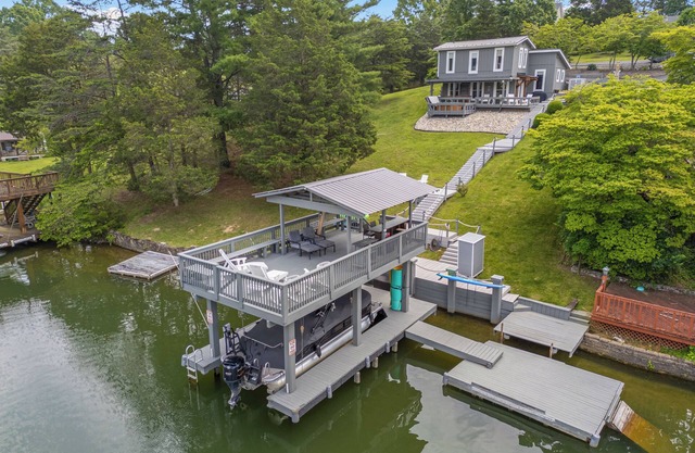 Hot tub, private dock, with water front lake access for relaxing or exploring.
