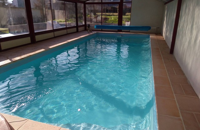 House can accommodate 18 people with swimming pool and spa covered