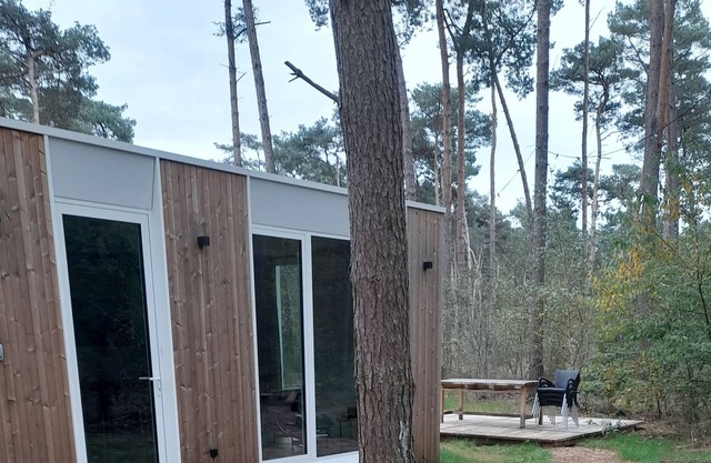 House in the middle of the forest with hot tub