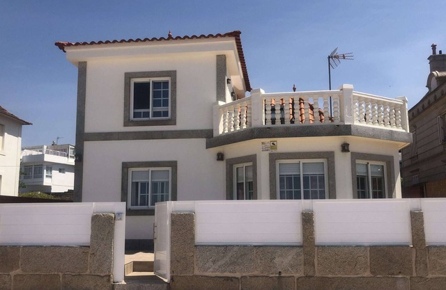 HOUSE ON THE FIRST LINE OF THE BEACH
