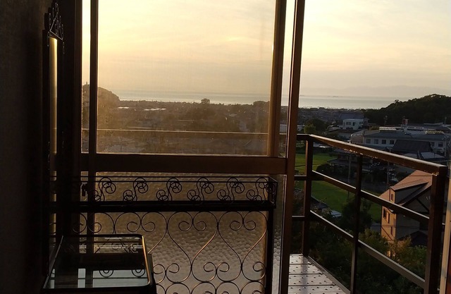 House overlooking the sea from the top of a hill