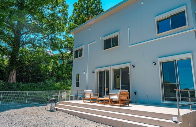 House surrounded by trees with a dog run/Kamogun Shizuoka