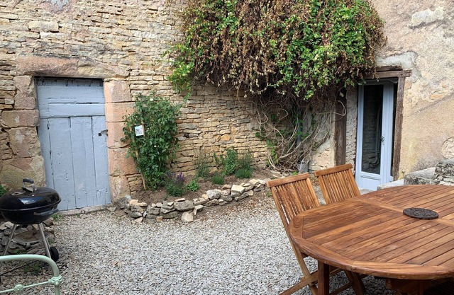 House with garden in village center