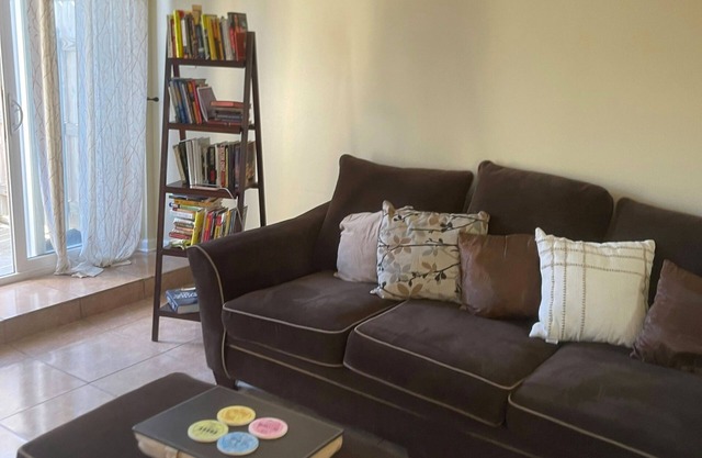 Ideally located townhome with updated kitchen, patio, & W/D - dog-friendly